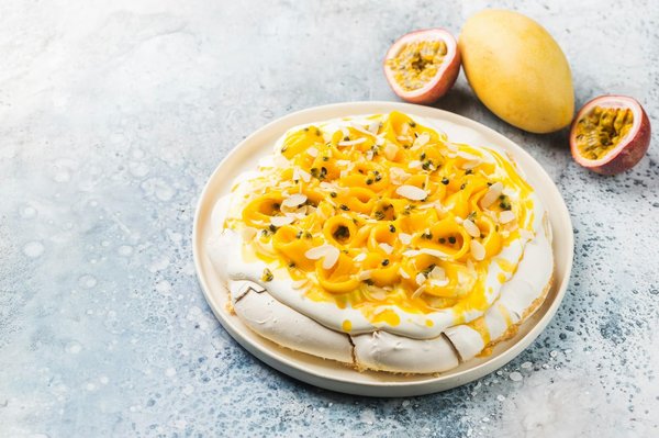 How Can You Create a Gourmet Fruit Pavlova with Passionfruit Curd?